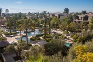 an aerial view of a resort with palm trees at Four Seasons Resort Marrakech in Marrakech