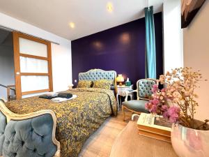 Postel nebo postele na pokoji v ubytování La Maison Poème - 10 min from Fontainebleau