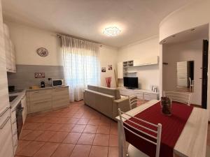 Una televisión o centro de entretenimiento en Casa Viotti Monza