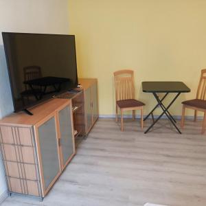 TV a/nebo společenská místnost v ubytování NEU! Ferienwohnung Biberburg EG