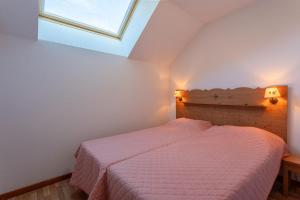 Postel nebo postele na pokoji v ubytování Les Granges - Vue Panoramique