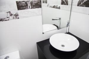 Um banheiro em Mariategui Hotel & Suites