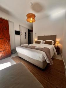 Ένα ή περισσότερα κρεβάτια σε δωμάτιο στο GaliniCafe22-suites