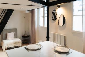 Ένα ή περισσότερα κρεβάτια σε δωμάτιο στο Casa Gallia - Appartement au cœur du centre-ville