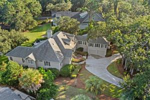 an aerial view of a house with a driveway at Cane Current in Hilton Head Island +67 photos