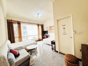 TV a/nebo společenská místnost v ubytování 花蓮羽竹民宿 -附車位-