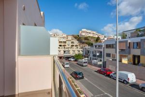 a view of a city street from a building at Obsidian Aregoma La Caleta in Adeje
