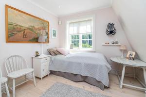 Postel nebo postele na pokoji v ubytování SOD680-Katrineholm-Strangsjoe-Eknaes-0