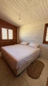 En eller flere senge i et værelse på Casa Gemini