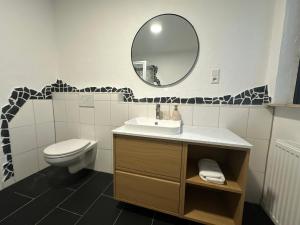 Koupelna v ubytování Ferienwohnung Kassel Harleshausen mit Ladesäule