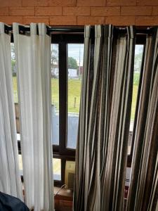 En balkon eller terrasse på Casa completa com piscina e hidromassagem