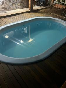 Swimmingpoolen hos eller tæt på Casa completa com piscina e hidromassagem