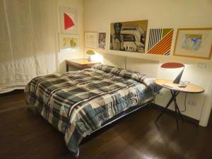 Ένα ή περισσότερα κρεβάτια σε δωμάτιο στο Casa Giotto