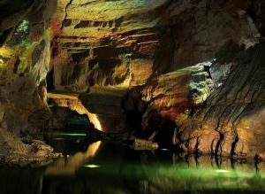 a cave with a body of water in it at Can Pitu in Alfondeguilla