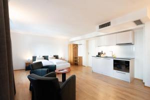 Una cocina o cocineta en Hotel Le Lion - Self Check-in