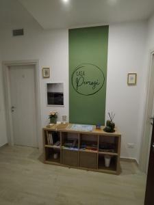 TV a/nebo společenská místnost v ubytování Casa Pemogi