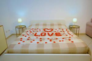 Ένα ή περισσότερα κρεβάτια σε δωμάτιο στο Annarella's Home