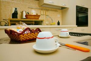 Η κουζίνα ή μικρή κουζίνα στο Annarella's Home +18 φωτογραφίες