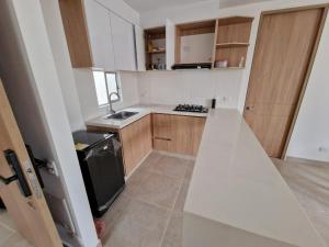 Η κουζίνα ή μικρή κουζίνα στο Apartamento en Cartagena, Manzanillo +5 φωτογραφίες