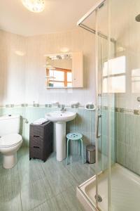 Ένα μπάνιο στο San Justo Suites