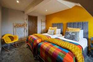 Postel nebo postele na pokoji v ubytování Narrowgate Apartments