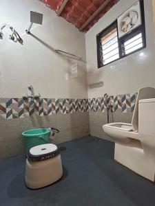 Ένα μπάνιο στο Lakshmi Homestay