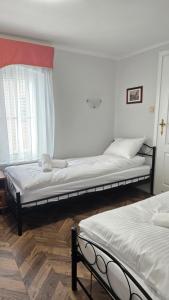 Postel nebo postele na pokoji v ubytování Willa Jana