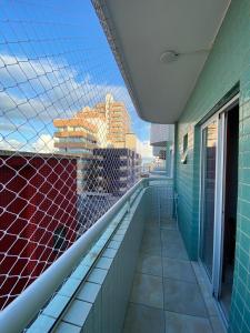 Un balcon sau o terasă la Apto Boqueirão próximo e com vista Mar