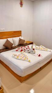 Postel nebo postele na pokoji v ubytování Celeste Thoddoo Maldives