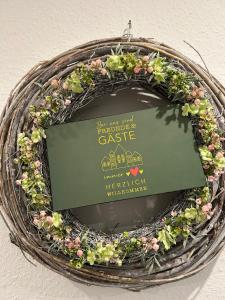 Πιστοποιητικό, βραβείο, πινακίδα ή έγγραφο που προβάλλεται στο Haus Egon