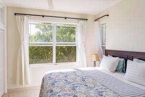 Ένα ή περισσότερα κρεβάτια σε δωμάτιο στο Wyakha 2 Ocean View