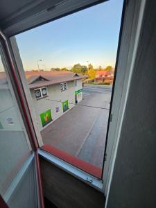 a view of a building from a window at Apartament 3 in Biała Podlaska