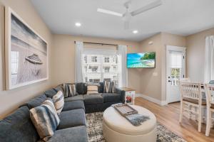 a living room with a couch and a table at 240 Olive Shell Court in Hilton Head Island