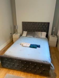 Ένα ή περισσότερα κρεβάτια σε δωμάτιο στο Luxury home from home 2