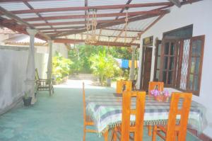 Patio nebo venkovní prostory v ubytování Talalla Mango House