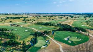 an overhead view of a group of golf courses at Homes in Prosper in Prosper