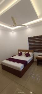 Postel nebo postele na pokoji v ubytování Cardamom Vista Holiday Home