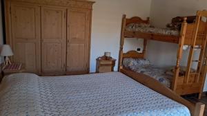 Ένα ή περισσότερα κρεβάτια σε δωμάτιο στο Az. Agr. Sponga Giancarlo