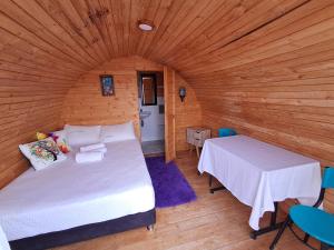 Postel nebo postele na pokoji v ubytování Cabaña Estelar