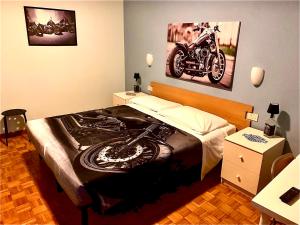 Una cama o camas en una habitación de Albergo della Posta