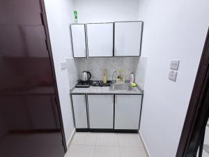 Una cocina o kitchenette en Studio R2