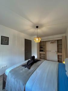 En eller flere senge i et værelse på Appartement moderne - Sur le sentier des vignes