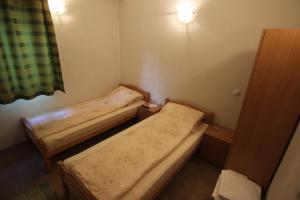 Letto o letti in una camera di Rooms Zebax