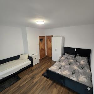 Postel nebo postele na pokoji v ubytování Casa Ghighiu