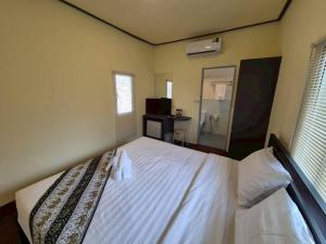 Postel nebo postele na pokoji v ubytování Chang Life Resort