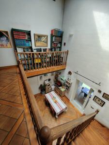an overhead view of a living room with a spiral staircase at Gurbialde Etxea in Mutriku