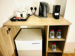 Η κουζίνα ή μικρή κουζίνα στο Plateia suite Grigio