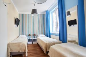 Posteľ alebo postele v izbe v ubytovaní Premium Hostel