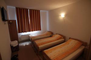 Letto o letti in una camera di Rooms Zebax