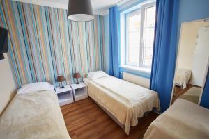 Posteľ alebo postele v izbe v ubytovaní Premium Hostel